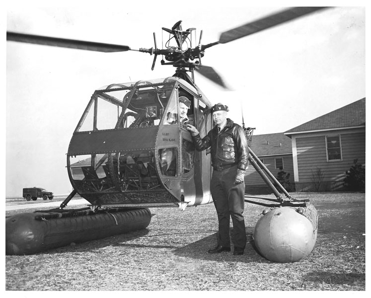 LCDR Frank Erickson and ENS Walter Bolton with an HNS-1. (Coast Guard Historian’s Office) LCDR Frank Erickson and ENS Walter Bolton with an HNS-1. (Coast Guard Historian’s Office)